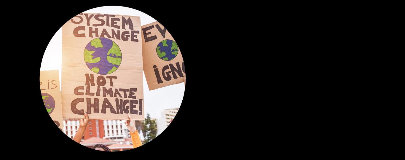 Pancartes met slogans tegen klimaatverandering